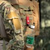 Катарама за закрепване на бутилка към колан